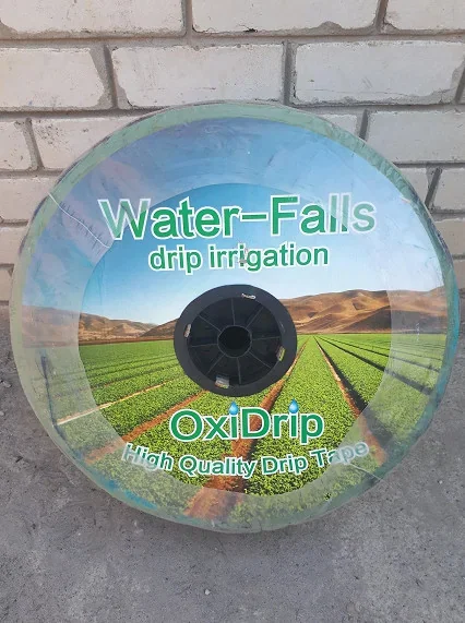 Стрічка OxiDrip емітерна 8 mils через 20см, водовилив1,38л/ч 1км/бухта. от Oxi - купить в интернет-магазине