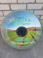 Стрічка OxiDrip емітерна 8 mils через 10см, водовилив 1,38 л/ч 1км/бухта. от Oxi - купить в интернет-магазине
